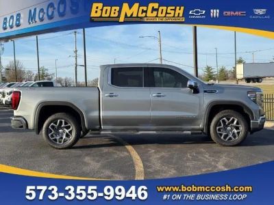 2026 GMC Sierra 1500 SLT in Sterling Metallic — front three-quarter view