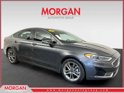 2020 Ford Fusion SEL in Magnetic Metallic — front three-quarter view