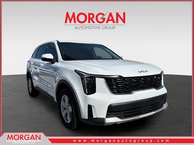 2026 Kia Sorento LX in Glacial White Pearl — front three-quarter view