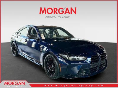 2026 BMW M3 Competition in Blue — front three-quarter view