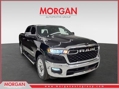 2026 Ram 1500 Big Horn in Diamond Black Crystal Pearlcoat — front three-quarter view