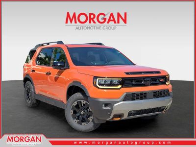 2026 Honda Passport TrailSport Elite in Sunset Orange — front three-quarter view