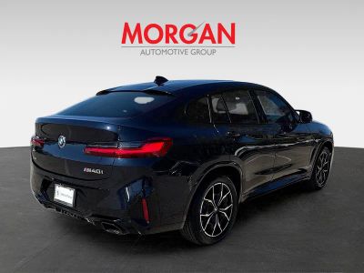 2024 BMW X4 — rear three-quarter view