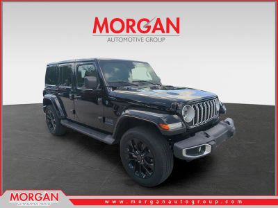 2025 Jeep Wrangler Sahara 4xe in Black — front three-quarter view