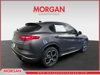 2023 Alfa Romeo Stelvio Ti in Vesuvio Gray Metallic — front three-quarter view