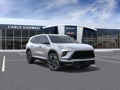 2026 Buick Enclave Sport Touring in Moonstone Gray Metallic — front three-quarter view