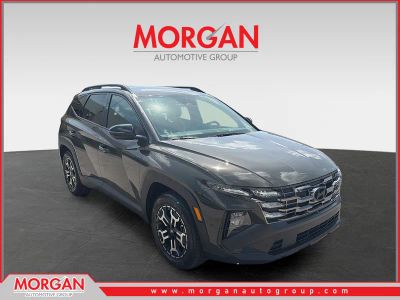 2026 Hyundai Tucson XRT in Rockwood Green — front three-quarter view