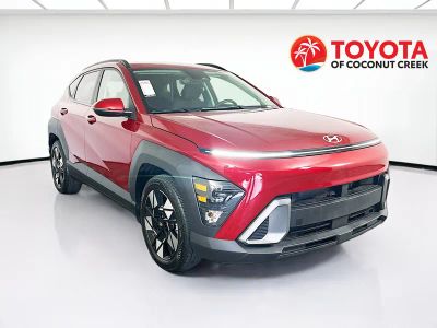 2024 Hyundai Kona SEL in Ultimate Red Metallic — front three-quarter view