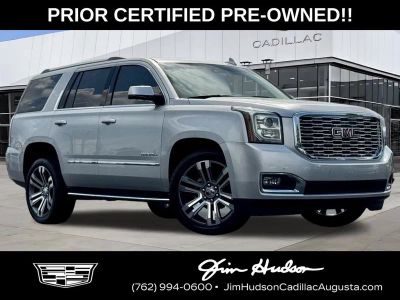 2018 GMC Yukon Denali in Quicksilver Metallic — front three-quarter view