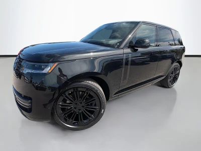 2026 Land Rover Range Rover SE in Santorini Black — front three-quarter view