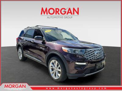 2023 Ford Explorer Platinum in Red Metallic — front three-quarter view