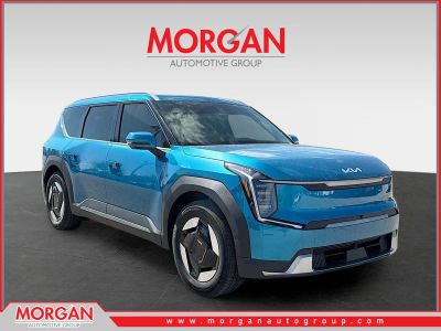 2026 Kia EV9 Wind in Ocean Blue — front three-quarter view