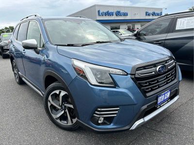 2023 Subaru Forester Touring in Horizon Blue Pearl — front three-quarter view