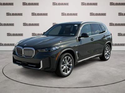 2026 BMW X5 xDrive40i in Dravit Grey Metallic — front three-quarter view