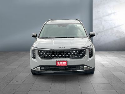 2026 Kia Carnival Hybrid — rear three-quarter view