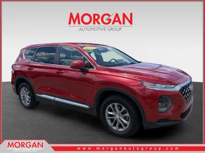 2019 Hyundai Santa Fe SE in Scarlet Red — front three-quarter view
