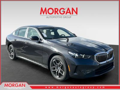 2026 BMW 5 Series 530i in Gray — front three-quarter view