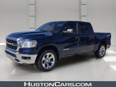 2024 RAM 1500 Big Horn 4x4 Crew Cab 5'7" Box in Patriot Blue Pearlcoat — front three-quarter view