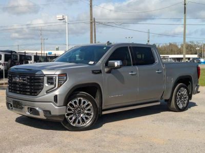 2023 GMC Sierra 1500 Denali Ultimate in Silver — front three-quarter view