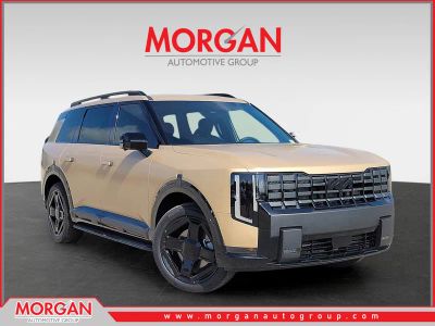 2027 Kia Telluride Hybrid X-Line SX in Terrain Brown Matte — front three-quarter view