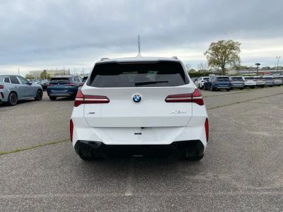 2026 BMW X3 — rear three-quarter view