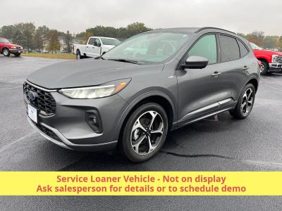 2023 Ford Escape ST LINE SELECT AWD in Carbonized Gray Metallic — front three-quarter view
