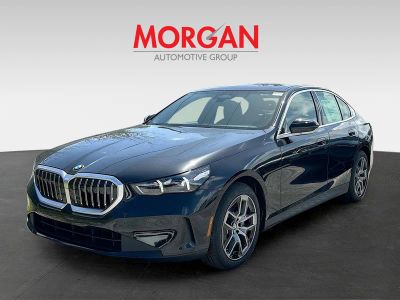 2026 BMW 5 Series — rear three-quarter view