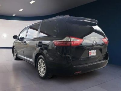 2015 Toyota Sienna — rear three-quarter view