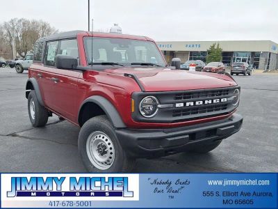 2026 Ford Bronco Base in Ruby Red Metallic — front three-quarter view