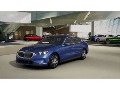 2027 BMW 5 Series 530i xDrive in Phytonic Blue Metallic — front three-quarter view