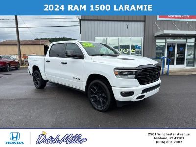 2024 RAM 1500 Laramie in Bright White Clearcoat — front three-quarter view