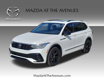 2024 Volkswagen Tiguan 2.0T SE R-Line Black in White — front three-quarter view