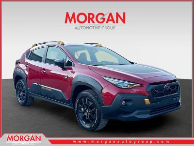 2026 Subaru Crosstrek Wilderness in Lithium Red Pearl — front three-quarter view