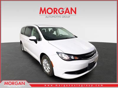2023 Chrysler Voyager LX in Bright White Clearcoat — front three-quarter view