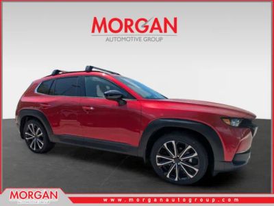 2026 Mazda CX-50 2.5 Turbo Premium Plus in Soul Red Crystal Metallic — front three-quarter view
