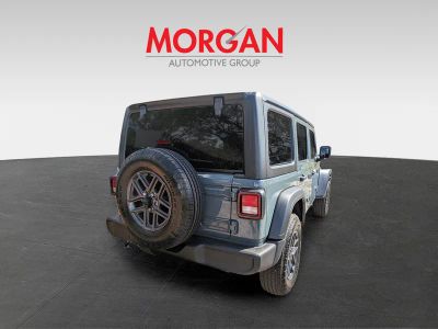 2026 Jeep Wrangler — rear three-quarter view