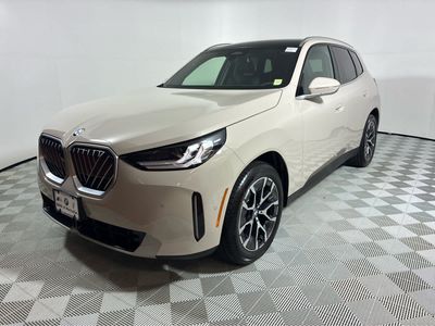 2025 BMW X3 30 xDrive 30 xDrive in Dune Grey Metallic — front three-quarter view
