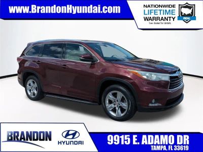 2015 Toyota Highlander Limited in Red — front three-quarter view