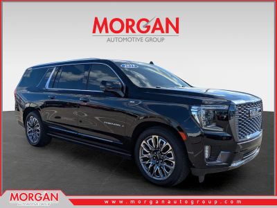 2023 GMC Yukon XL Denali Ultimate in Onyx Black — front three-quarter view