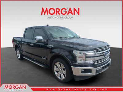 2018 Ford F-150 Lariat in Black — front three-quarter view