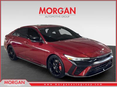2025 Hyundai Elantra N Base in Red — front three-quarter view
