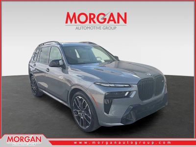 2025 BMW X7 M60i in Skyscraper Grey Metallic — front three-quarter view