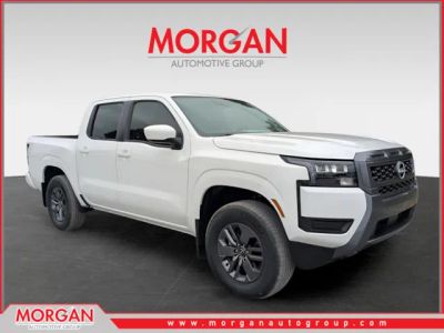 2026 Nissan Frontier SV in White — front three-quarter view