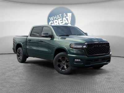 2026 RAM 1500 Big Horn/Lone Star in Serrano-Green Metallic Exterior Paint — front three-quarter view