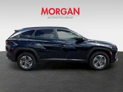 2025 Hyundai Tucson Hybrid — side profile view