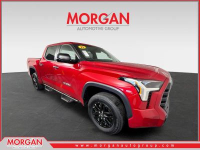 2025 Toyota Tundra SR5 in Supersonic Red — front three-quarter view
