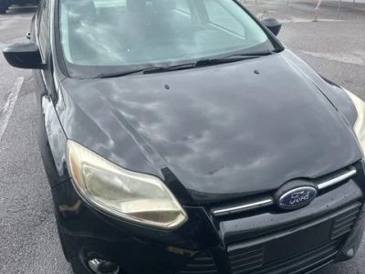 2012 Ford Focus SE in Black — front three-quarter view