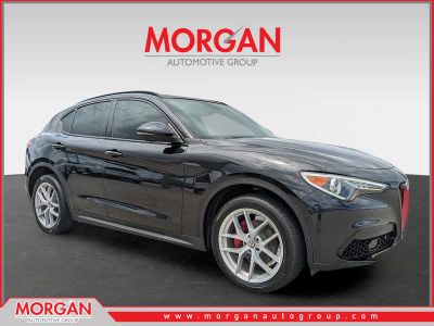 2019 Alfa Romeo Stelvio Ti Sport in Vulcano Black Metallic — front three-quarter view