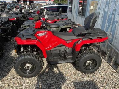 2026 Polaris® Sportsman Touring 570-Indy Red — front three-quarter view