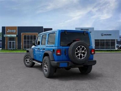 2026 Jeep Wrangler — rear three-quarter view